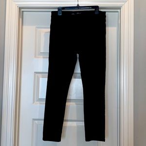 Black skinny pants. Button, zipper, real pockets.